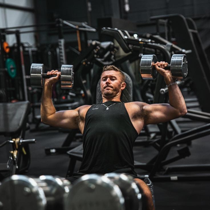 Professional gym interior featuring strength-training equipment